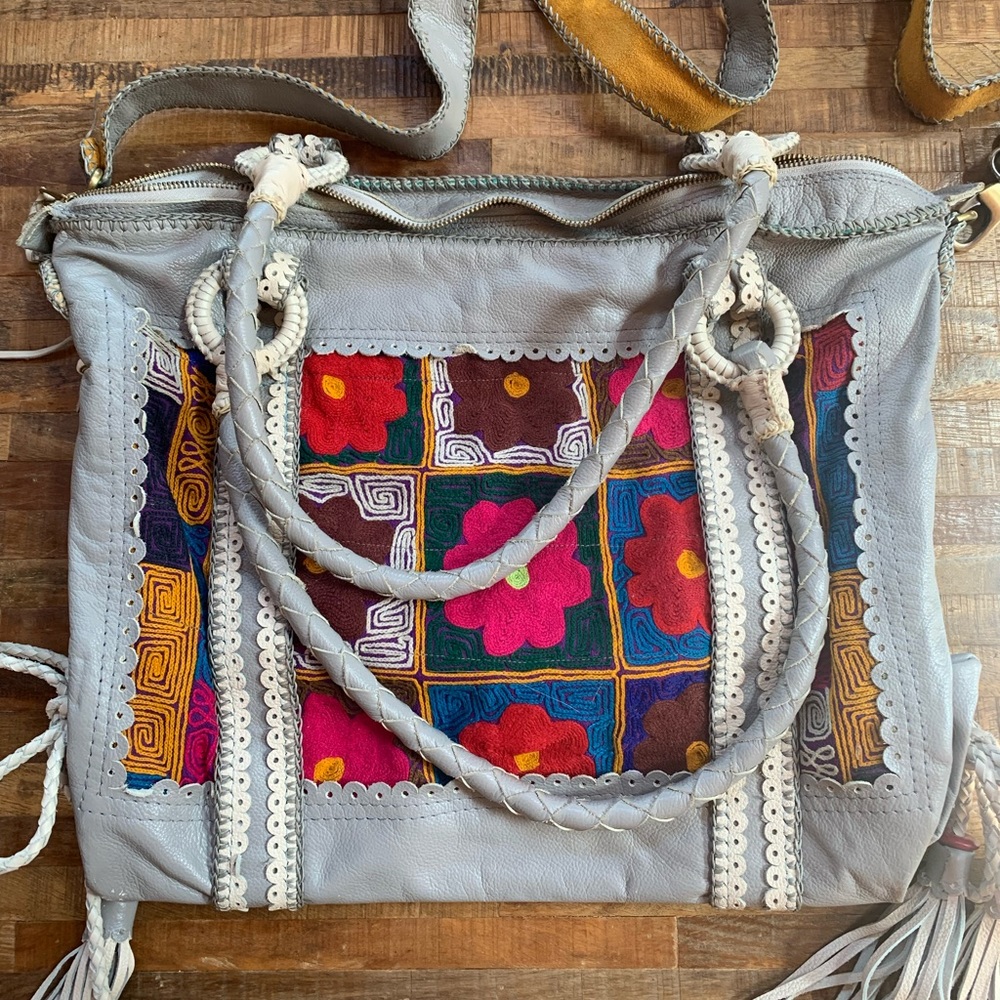 Unique find! World family colorful embroidered bag with tassels
